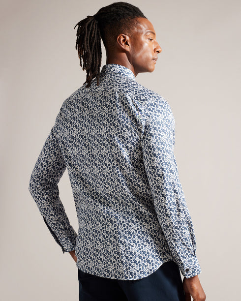 CAPUA-Shirts-Revamp your wardrobe with our CAPUA shirt, crafted from a comfortable cotton blend. This shirt is a must-have, featuring a charming ditsy floral print that adds a playful touch to your look. Button up shirt Cotton blend Ditsy floral print Long sleeved Classic collar- Ted Baker Romania